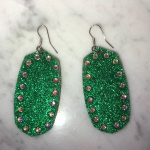 Green dangle earrings with jewels